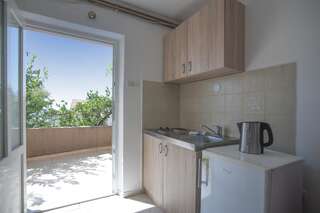 Апартаменты Apartments Grand Свети-Стефан Номер-студио с террасой-8